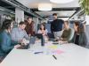 IT-Team arbeitet gemeinsam an Projekten bei FIVE Informatik